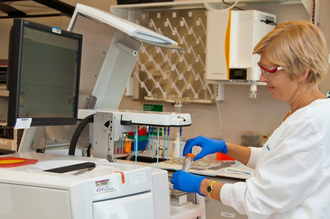 A technician preparing to run microbial genomes on the Roche 454 sequencing platform at the Advanced Technology Research Facility (ATRF), Frederick National Laboratory for Cancer Research, National Cancer Institute.